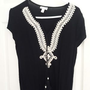 Black shirt with white neck detail
